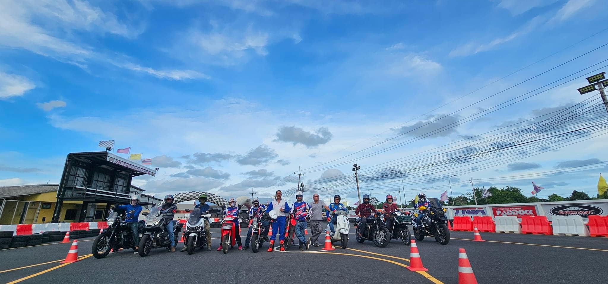 Rider lineup at corporate event on track
