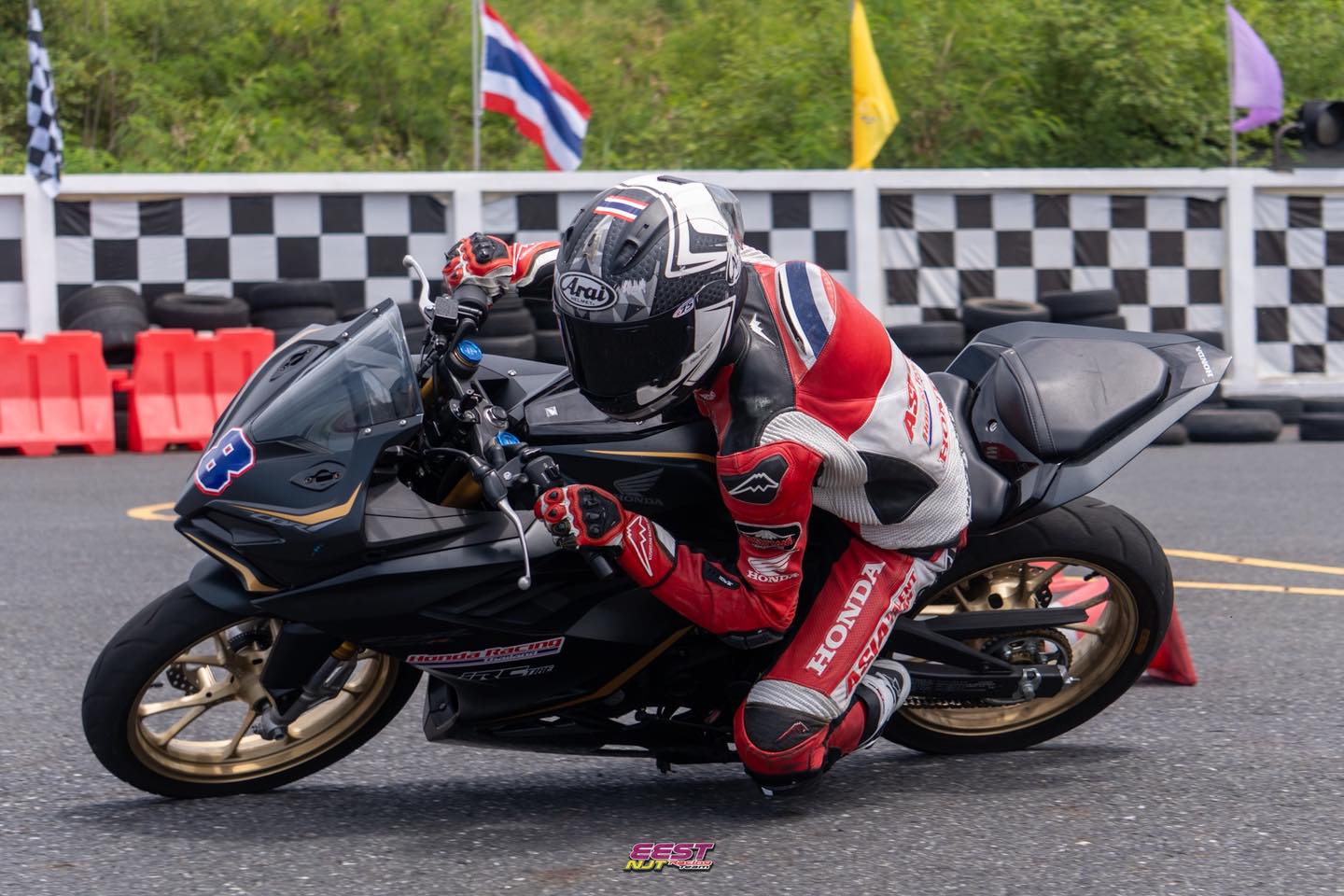 รถแข่ง MiniGP Honda บนสนาม EEST NJT / A Honda MiniGP race bike on the EEST NJT track